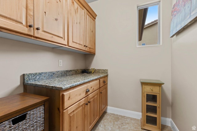714 N Millcreek Springs Dr, Washington, UT 84780 - laundry area with baseboards