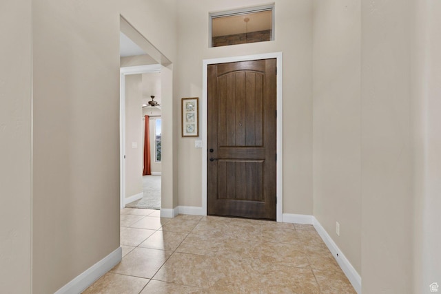 714 N Millcreek Springs Dr, Washington, UT 84780 - tiled entryway with baseboards and a ceiling fan