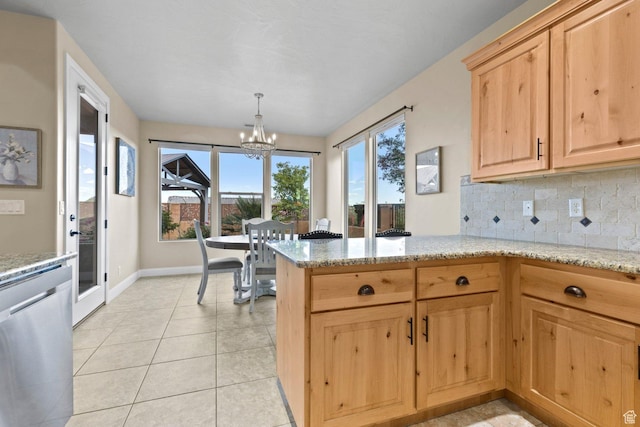 714 N Millcreek Springs Dr, Washington, UT 84780 - kitchen featuring a chandelier, light brown cabinets, baseboards, decorative backsplash, and light stone countertops