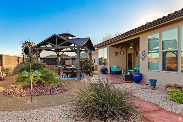 714 N Millcreek Springs Dr, Washington, UT 84780 - view of patio featuring a gazebo and fence