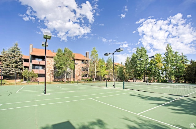 6861 N 2200 W Unit 9D, Park City, UT 84098 - view of sport court featuring community basketball court and fence