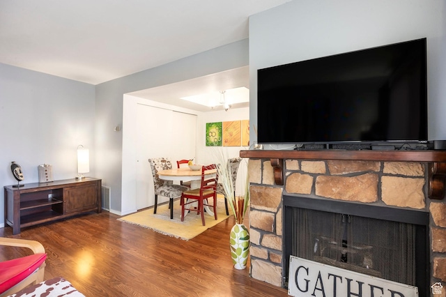 6861 N 2200 W Unit 9D, Park City, UT 84098 - living area featuring wood finished floors and a stone fireplace