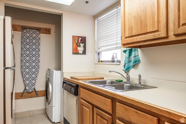 6861 N 2200 W Unit 9D, Park City, UT 84098 - kitchen with light countertops, a sink, washer / clothes dryer, light tile patterned floors, and white appliances