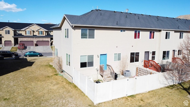 2016 E Cedar Trails Way, Eagle Mountain, UT 84005 - rear view of property with central AC unit
