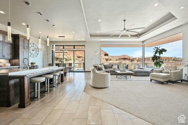 3052 N Snow Canyon Pkwy Unit 36, St George, UT 84770 - living room featuring recessed lighting and a raised ceiling