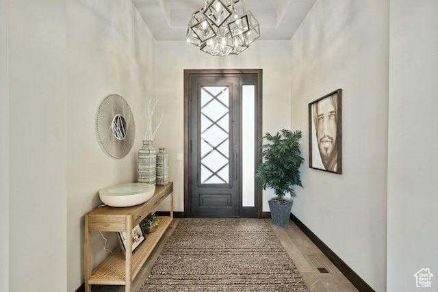 3052 N Snow Canyon Pkwy Unit 36, St George, UT 84770 - entrance foyer with baseboards and a chandelier