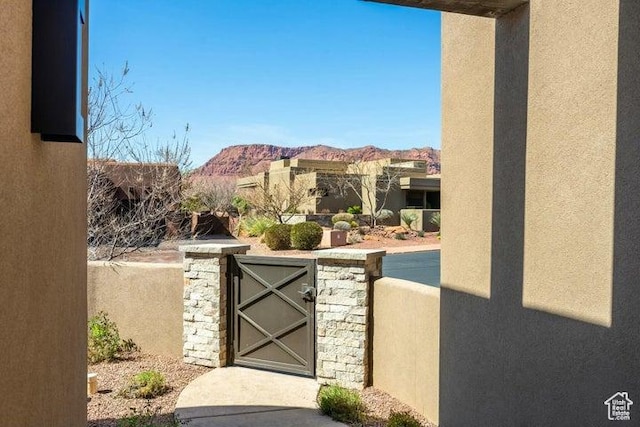 3052 N Snow Canyon Pkwy Unit 36, St George, UT 84770 - view of gate with a mountain view