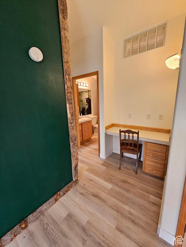 2350 S Red Creek Rd, Fruitland, UT 84027 - hall with baseboards, visible vents, and light wood-style floors