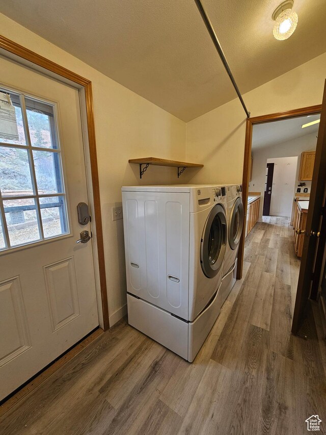 2350 S Red Creek Rd, Fruitland, UT 84027 - laundry room with independent washer and dryer, light wood-type flooring, laundry area, and baseboards