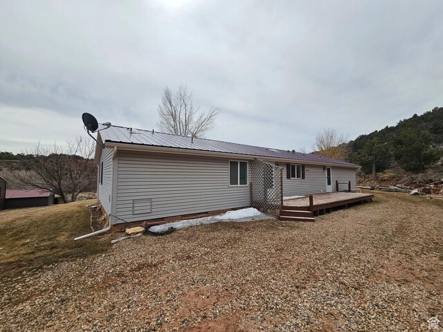 2350 S Red Creek Rd, Fruitland, UT 84027 - back of house featuring metal roof and a wooden deck