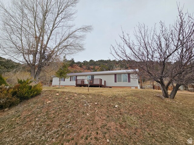 2350 S Red Creek Rd, Fruitland, UT 84027 - view of front of property with a front lawn, crawl space, and a deck