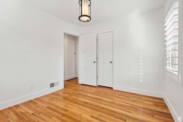 1138 E Hudson Ave, Salt Lake City, UT 84106 - interior space featuring baseboards, light wood-style floors, and visible vents
