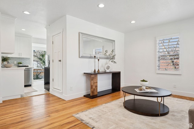 1138 E Hudson Ave, Salt Lake City, UT 84106 - living area featuring baseboards, light wood-type flooring, and recessed lighting