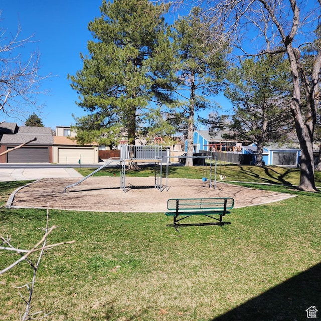 exterior space with playground community and a yard