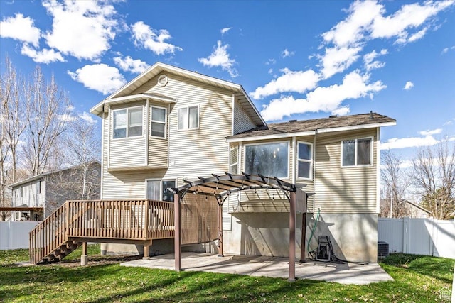 100 Crayon Ct, Logan, UT 84321 - rear view of property featuring a lawn, a deck, a patio area, a fenced backyard, and a pergola