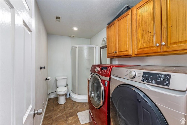 100 Crayon Ct, Logan, UT 84321 - laundry room with baseboards, visible vents, laundry area, and washing machine and clothes dryer
