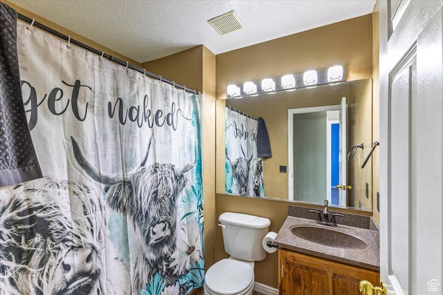100 Crayon Ct, Logan, UT 84321 - full bathroom with a textured ceiling, visible vents, vanity, toilet, and a shower with shower curtain