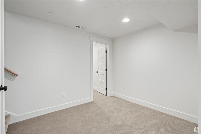 2230 S 635 W Unit B, Perry, UT 84302 - spare room featuring baseboards, visible vents, recessed lighting, and carpet