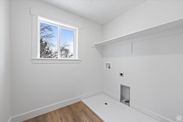 2230 S 635 W Unit B, Perry, UT 84302 - washroom featuring hookup for a washing machine, baseboards, wood finished floors, laundry area, and electric dryer hookup