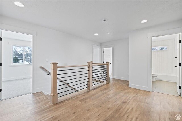 2230 S 635 W Unit B, Perry, UT 84302 - empty room featuring baseboards, recessed lighting, and light wood-style floors