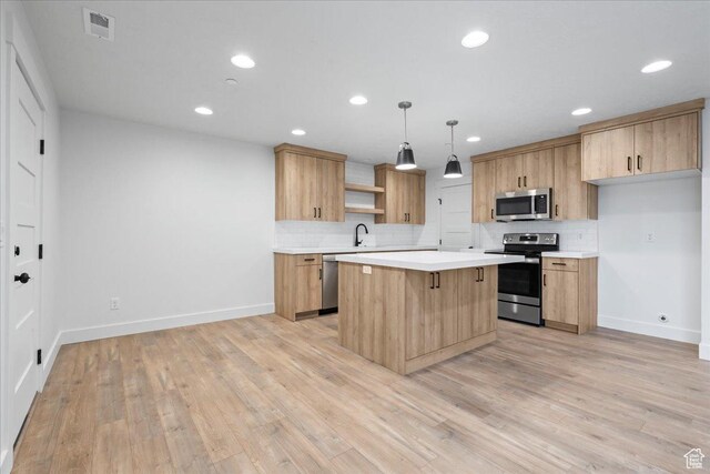 2230 S 635 W Unit B, Perry, UT 84302 - kitchen featuring light countertops, open shelves, stainless steel appliances, light wood-style floors, and decorative backsplash