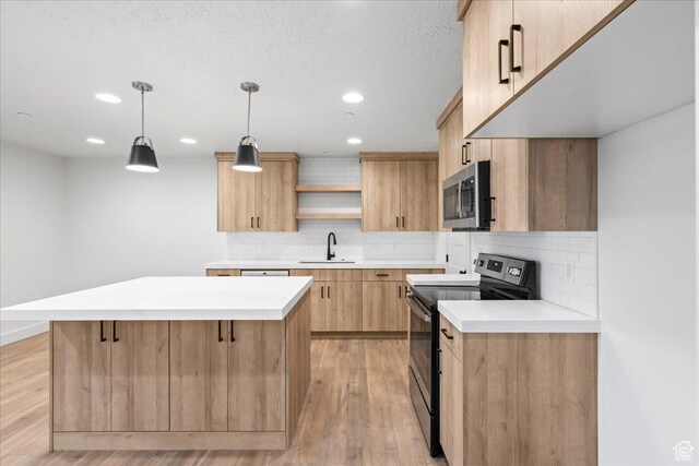 2230 S 635 W Unit B, Perry, UT 84302 - kitchen with a sink, open shelves, appliances with stainless steel finishes, light wood-style flooring, and light brown cabinets