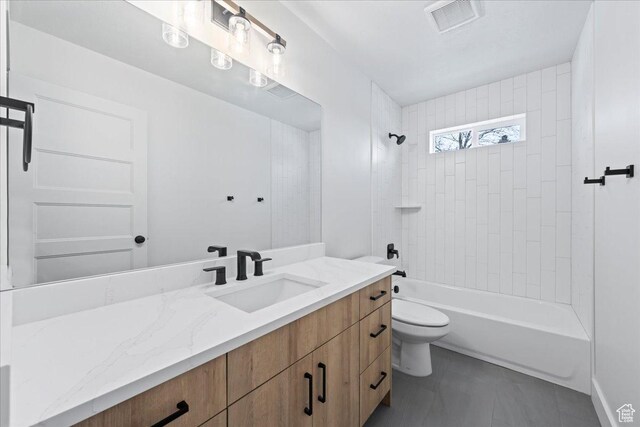 2230 S 635 W Unit B, Perry, UT 84302 - full bath featuring toilet, vanity,  shower combination, tile patterned flooring, and visible vents