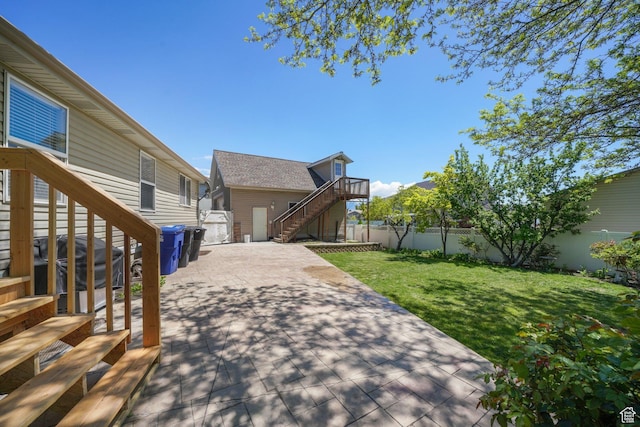3429 W Picabo St S, Taylorsville, UT 84129 - rear view of house featuring stairs and a patio