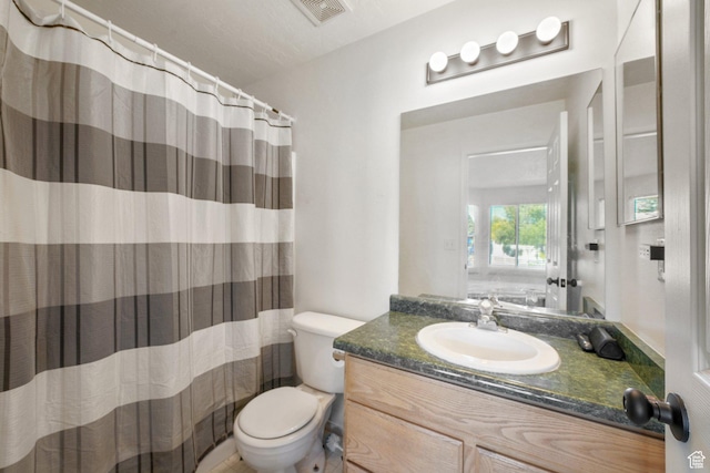 3429 W Picabo St S, Taylorsville, UT 84129 - bathroom featuring toilet, vanity, and a shower with curtain