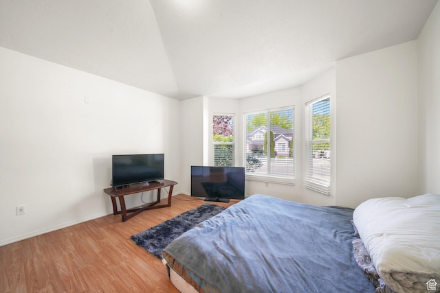 3429 W Picabo St S, Taylorsville, UT 84129 - bedroom featuring wood finished floors, baseboards, and lofted ceiling