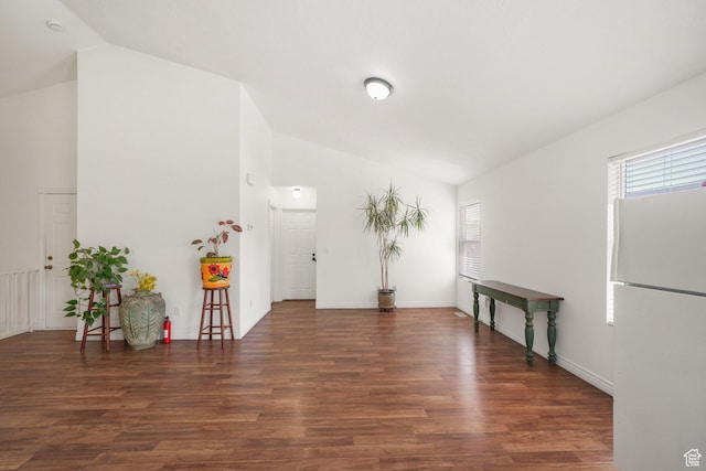 3429 W Picabo St S, Taylorsville, UT 84129 - foyer featuring wood finished floors, high vaulted ceiling, and baseboards