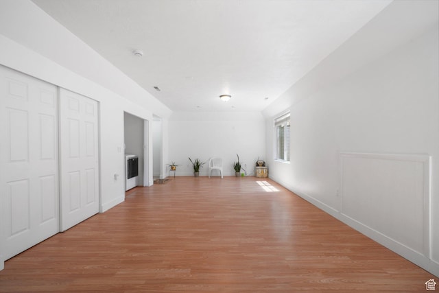 3429 W Picabo St S, Taylorsville, UT 84129 - unfurnished living room featuring light wood-style floors
