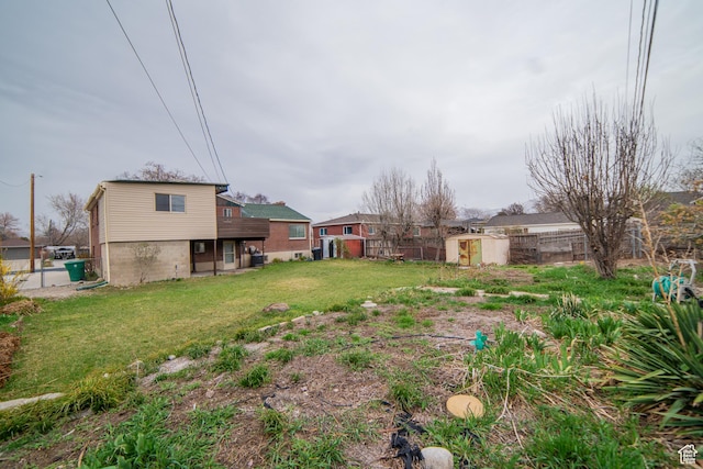 627 W La Salle Dr, Murray, UT 84123 - view of yard with a shed, an outbuilding, and fence