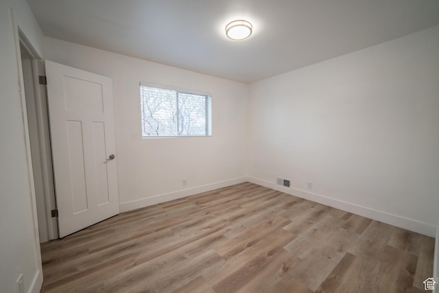 627 W La Salle Dr, Murray, UT 84123 - empty room with baseboards, visible vents, and light wood-style flooring