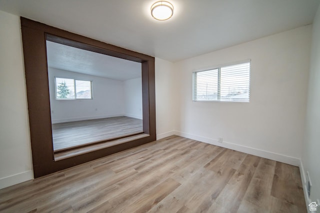 627 W La Salle Dr, Murray, UT 84123 - empty room with baseboards and light wood-type flooring