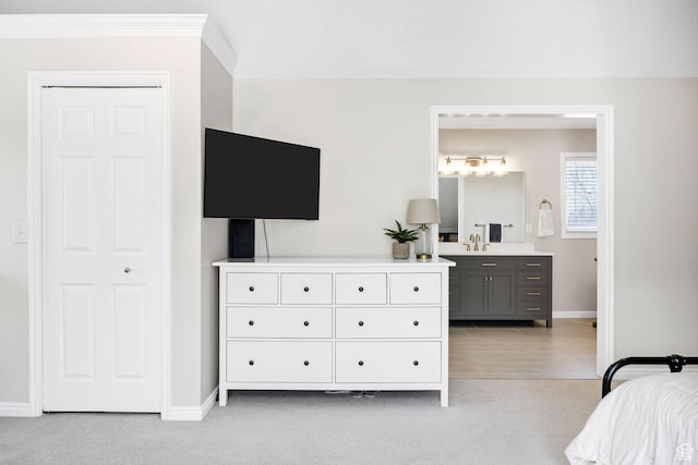 385 N 300 E, Providence, UT 84332 - bedroom with baseboards, connected bathroom, ornamental molding, and light colored carpet