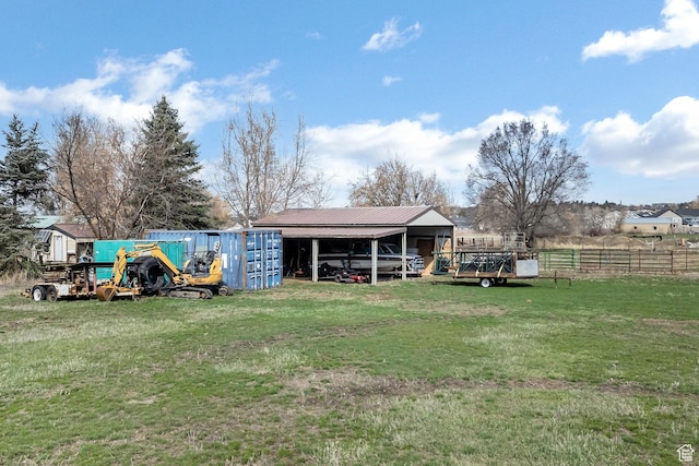 385 N 300 E, Providence, UT 84332 - view of yard featuring an outdoor structure, an outbuilding, and fence