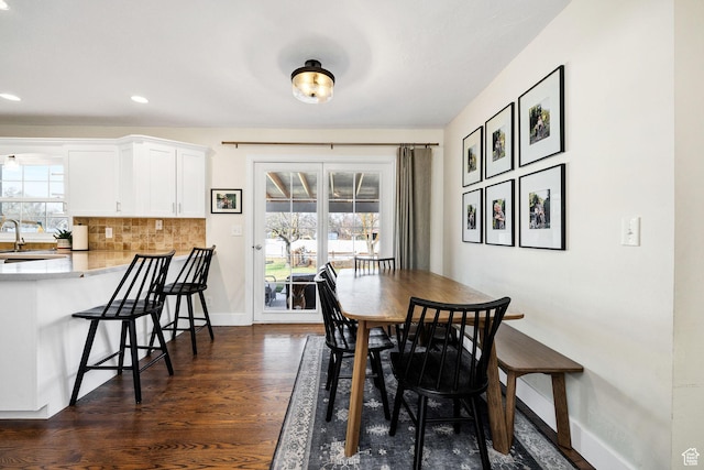 385 N 300 E, Providence, UT 84332 - dining room featuring dark wood-style flooring, baseboards, a healthy amount of sunlight, and recessed lighting