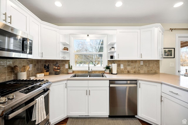 385 N 300 E, Providence, UT 84332 - kitchen featuring white cabinets, appliances with stainless steel finishes, a sink, open shelves, and a wealth of natural light
