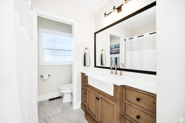 385 N 300 E, Providence, UT 84332 - full bathroom featuring baseboards, visible vents, toilet, and vanity