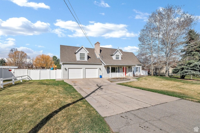 385 N 300 E, Providence, UT 84332 - cape cod house with fence, a garage, a front yard, driveway, and a porch