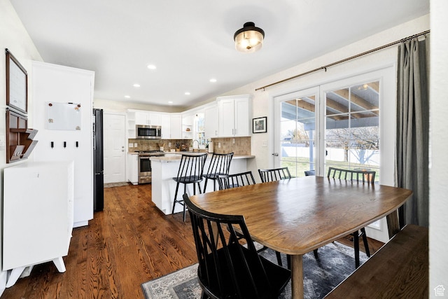 385 N 300 E, Providence, UT 84332 - dining area with dark wood-style floors and recessed lighting