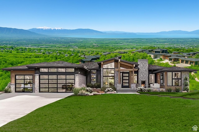 912 W Summit Creek Dr, Woodland Hills, UT 84653 - view of front of house with a mountain view, stone siding, and a front lawn