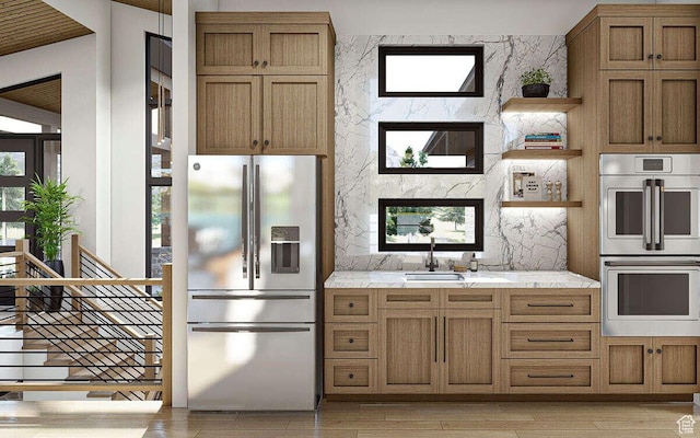 912 W Summit Creek Dr, Woodland Hills, UT 84653 - kitchen featuring appliances with stainless steel finishes, open shelves, a sink, backsplash, and light wood-type flooring