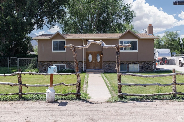 170 E 400 N, Monroe, UT 84754 - bi-level home with stone siding, stucco siding, and a chimney