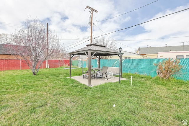 2645 S Masonic Cir E, South Salt Lake, UT 84115 - view of yard with a fenced backyard, a gazebo, and a patio area