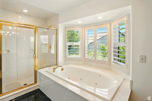 3011 N 1000 W, Pleasant View, UT 84414 - full bathroom with plenty of natural light, a jetted tub, a shower stall, and recessed lighting