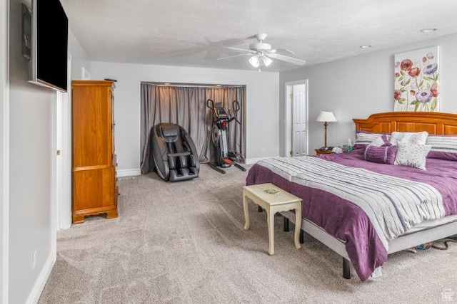 3011 N 1000 W, Pleasant View, UT 84414 - bedroom featuring baseboards, ceiling fan, and light colored carpet