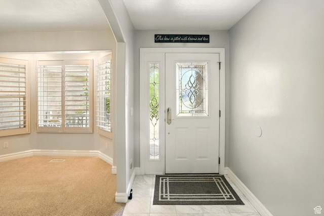 3011 N 1000 W, Pleasant View, UT 84414 - carpeted entryway with arched walkways and baseboards