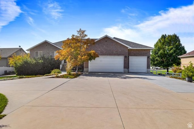 3011 N 1000 W, Pleasant View, UT 84414 - single story home featuring driveway, an attached garage, and brick siding